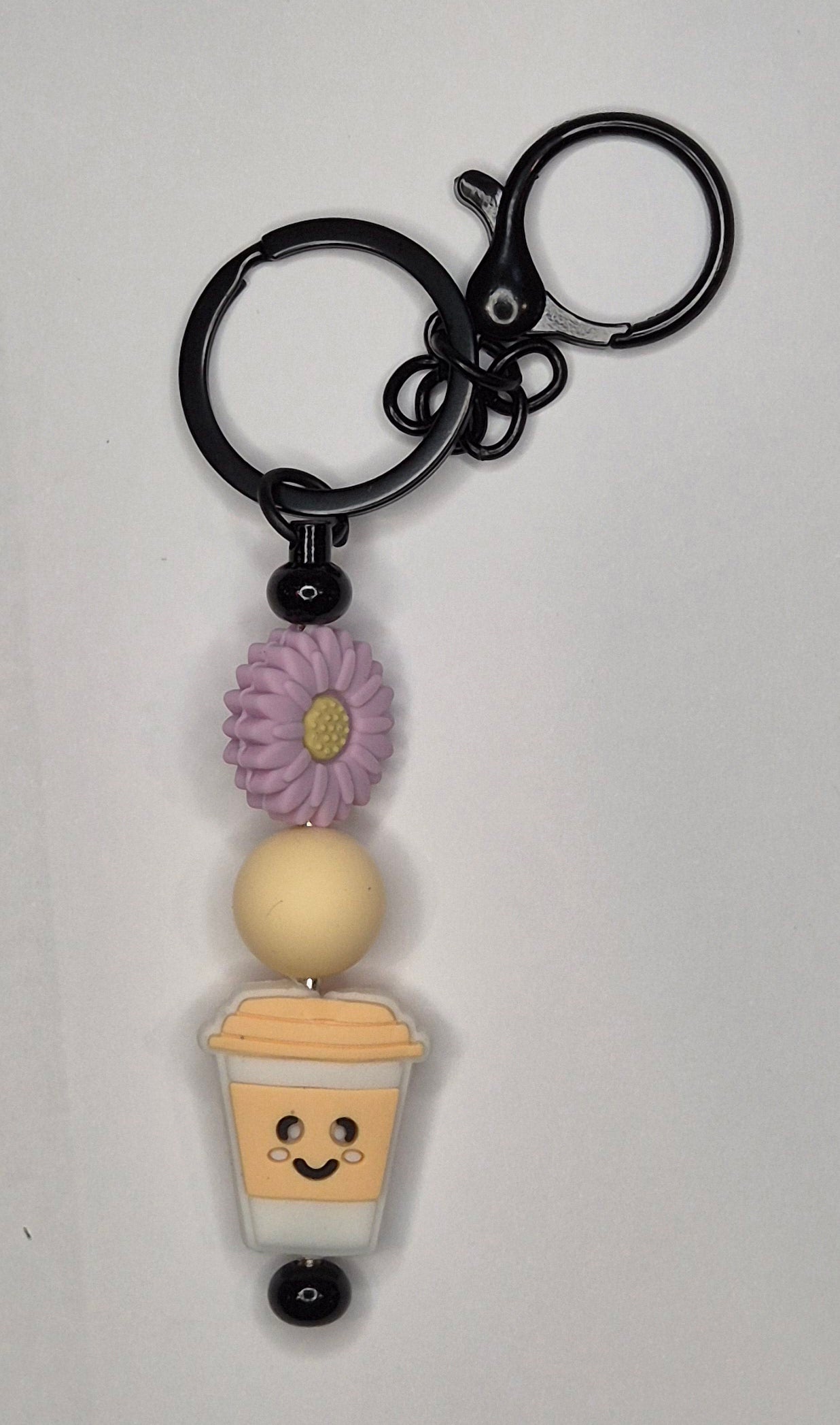 Butterscotch colour coffee cup bead on black keyring