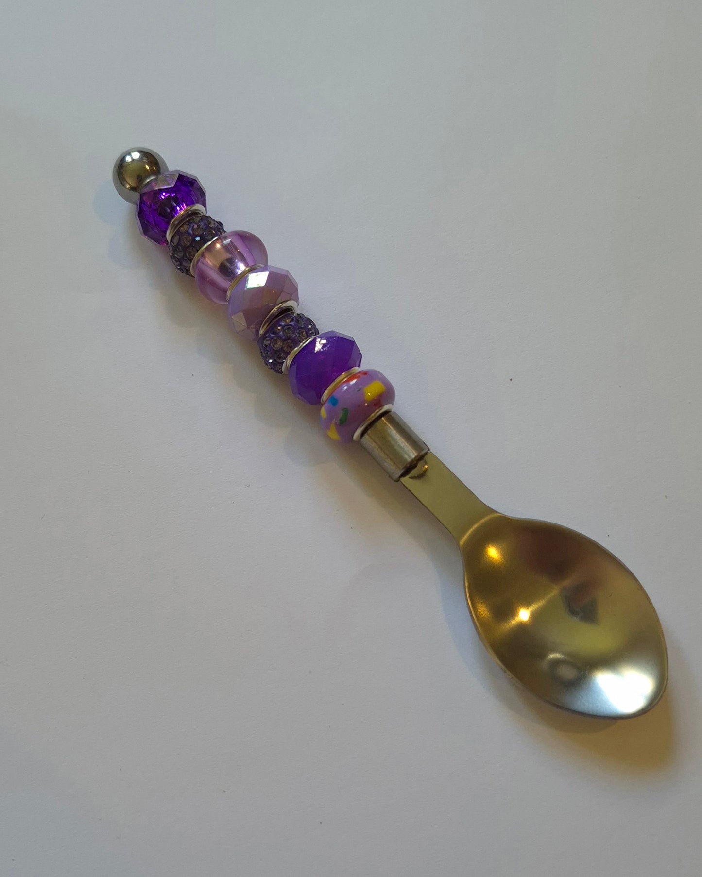 Purple beads decorated Teaspoon.