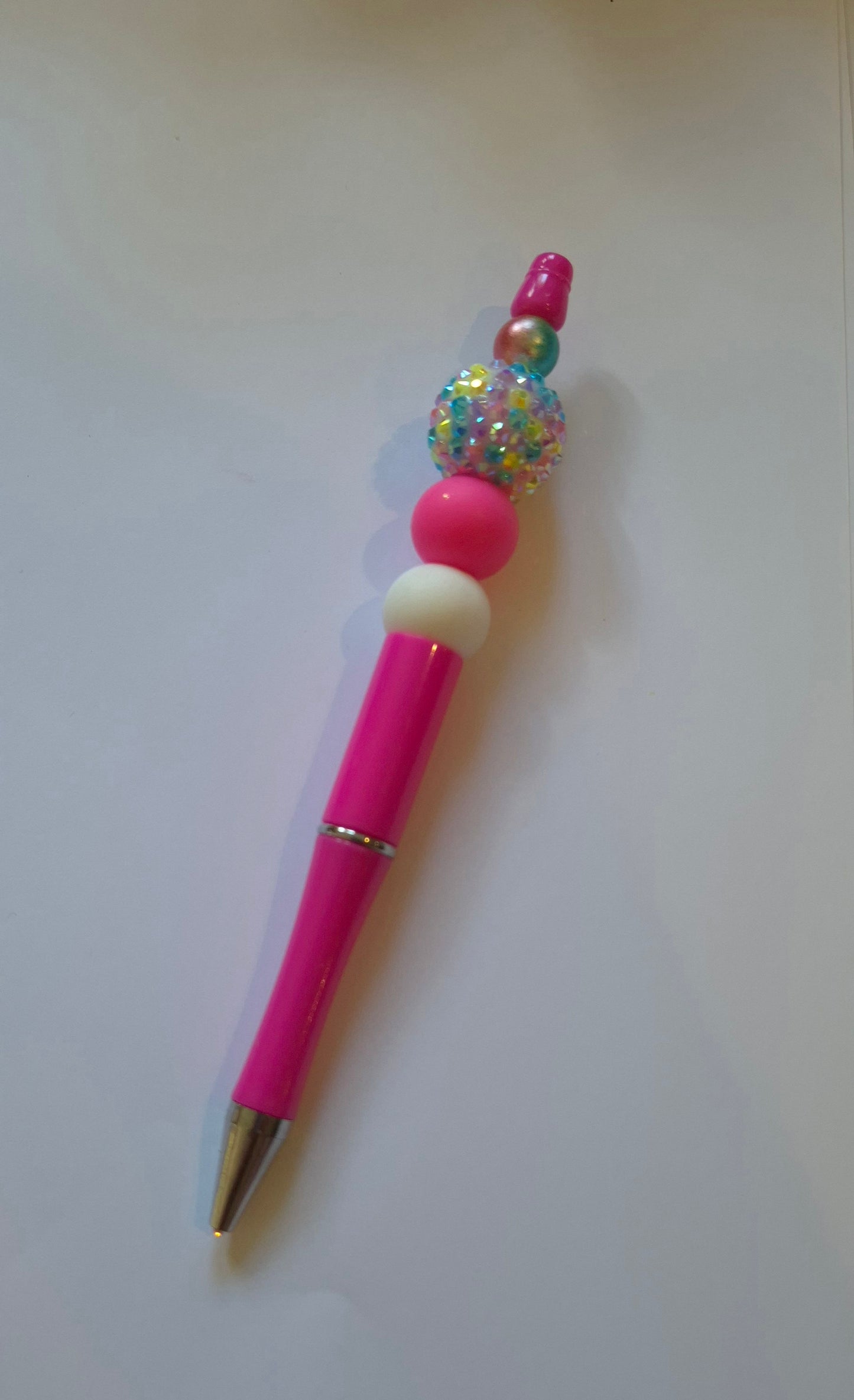 Bright pink pen with large bead