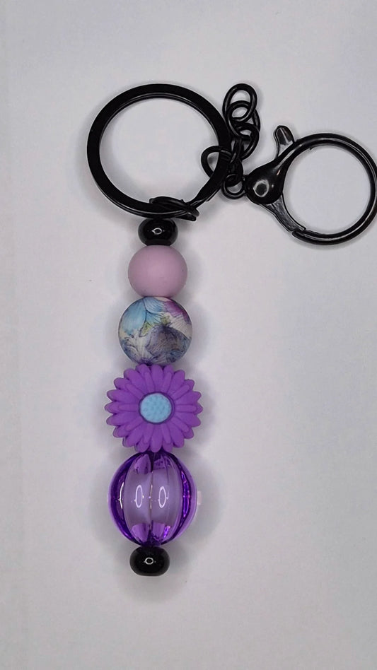 Black keyring with purple coloured beads